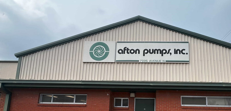 afton pumps inc logo on building